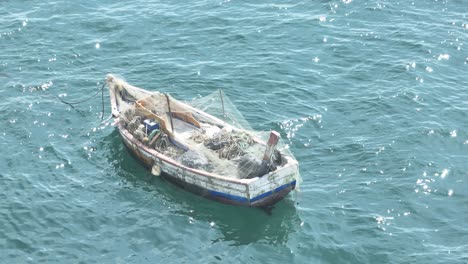 Fishing-Boat-Anchored-Peacefully-In-Calm-Blue-Water-In-Sunny-Day-,-Lima,-Peru