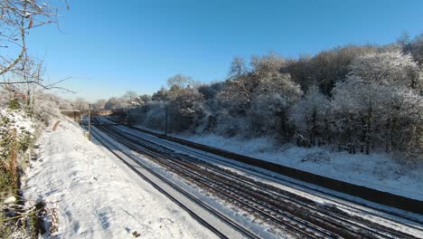 Snowed-empty-train-tracks-on-a-sunny-day