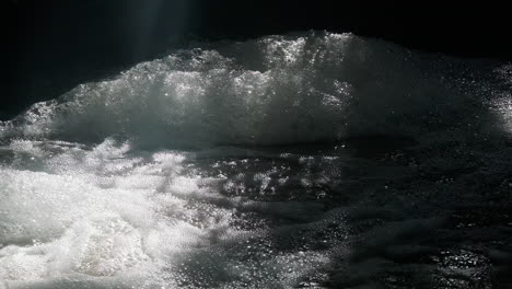 Bubbly-water-in-a-stream-making-massive-piles-of-foam