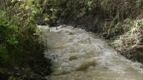 Rain-water-runoff-rushes-down-a-small-stream