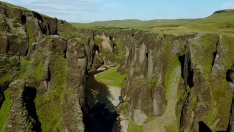 Fjaðrárgljúfur-Canyon-in-South-Iceland,-aerial-establishing-shot