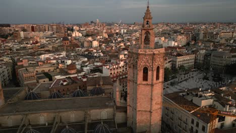 Valencia-Spain-Aerial-footage-of-the-Miguelet-Bell-Tower-and-Cathedral-at-sunset