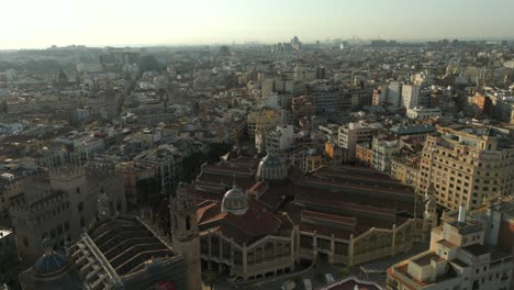 Aerial-backlit-morning-view-of-Valencia-central-market-in-Spain