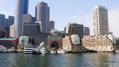 Low-drone-shot-of-Boston-skyline-from-Boston-harbor