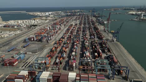 Aerial-view-of-Valencia,-Spain,-big-shipping-Cargo-Terminal-Containers-port,-sunny-summer