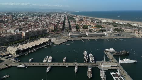 Panoramic-Aerial-shot-of-Valencia-Marina-in-hot-summer,-Spain