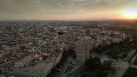 Panoramic-Aerial-view-of-historical-Valencia-Spain,-Gates-Serranos-landmark,-Summer-sunset
