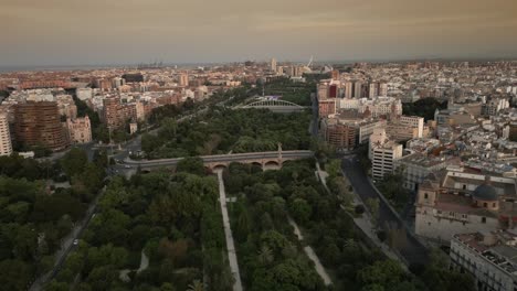 Sunset-Aerial-view-of-Turia-Park-in-Valencia,-Spain-4K