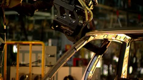 Proceso-Robótico-Industrial-De-Fabricación-De-Automóviles-En-Una-Fábrica