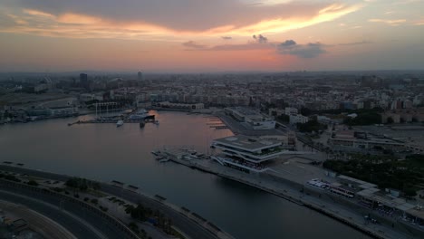Wide-Aerial-view-of-Valencia-marina-during-summer-sunset,-Spain