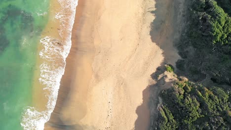 Bird's-Eye-Of-Waves-Fading-Smoothly-On-Torquay-Bells-Beach,-Australia