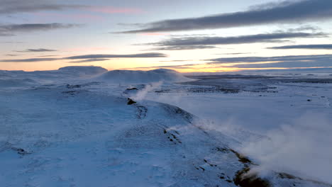 White-steam-comes-from-hot-sulphur-of-the-Myvatn-Volcano-in-the-snowy-Icelandic-landscape