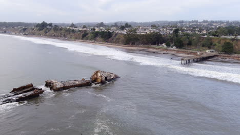 Much-of-Seacliff-Pier-is-gone-in-the-aftermath-of-a-storm-in-California,-January-2023--aerial-orbit