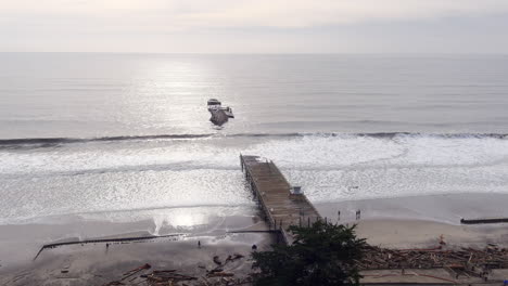 Aerial,-aftermath-of-pier-in-Seacliff-State-beach-destroyed-by-ocean-storm