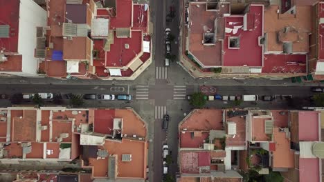 Drone-zenithal-shot-of-a-city's-intersection