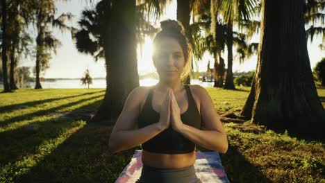 Beautiful-young-adult-waking-up-for-an-early-morning-outdoor-yoga-and-meditation-session