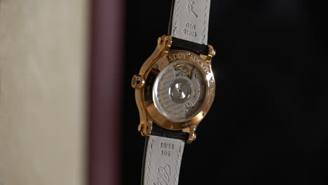 VERTICAL-rotating-rear-view-Luxury-Chopard-gold-Swiss-watch-mechanical-back-movement