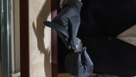 VERTICAL-Horologist-inspecting-expensive-luxury-Chopard-brand-watch-timepiece-in-Barcelona-jewellery-store