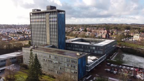 Aerial-view-Pilkington's-glass-head-office,-Corporate-blue-high-rise-with-shared-office-space