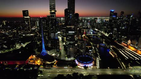 Rising-Aerial-Melbourne-Arts-district-golden-sunset-city-lights