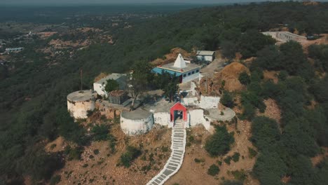 Aerial-drone-shot-of-a-hindu-temple-or-fort-on-a-hill-top-in-Gwalior-,-India