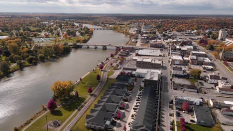 Residential-area-in-Downtown-Saginaw,-Michigan,-USA-by-Saginaw-River,-drone-view