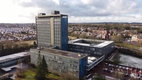 Aerial-view-Pilkington's-glass-head-office,-Blue-high-rise-with-shared-office-space-and-gardens