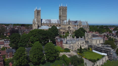 Establishing-Drone-Shot-Towards-Lincoln-Cathedral-on-Sunny-Day-UK
