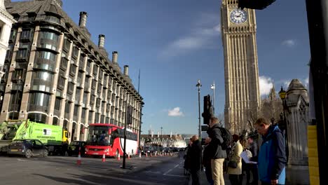 19-January-2023---People-Waiting-At-Traffic-Lights-On-Bridge-Street-With-Big-Ben-In-Background