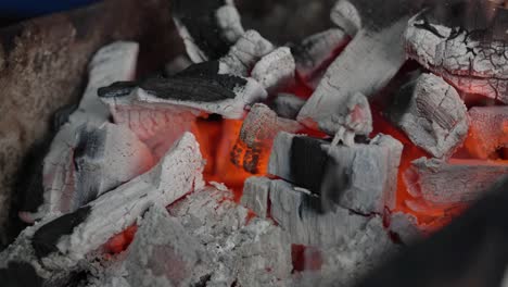 Smoky-red-charcoal-embers,-ready-for-cooking