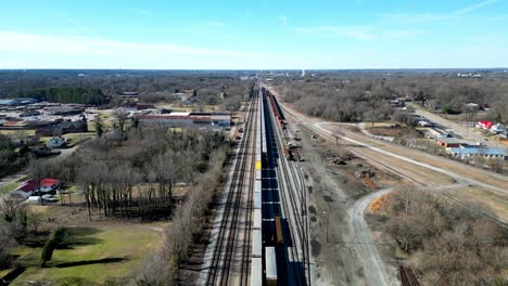Long-Train-Track-reverse-aerial-in-Winter-Time-at-North-Carolina-Transportation-Museum