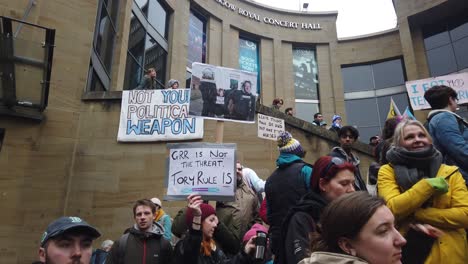 Close-up-of-Pro-Trans-protesters-on-the-steps-on-Buchanan-street-in-Glasgow