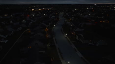Aerial-orbit-of-new-neighborhood-in-America-at-night