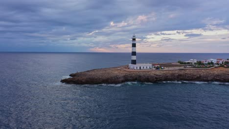 Aerial-Mavic-3-shot-Artrutx-lighthouse,-Cala-en-Bosch,-Menorca,-Spain