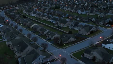 Aerial-hyperlapse-of-American-housing-development-as-sun-sets-on-winter-day