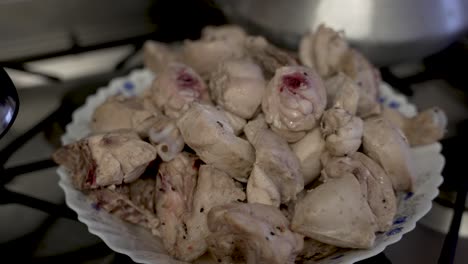 Pile-Of-Cooked-Meat-Chicken-Pieces-On-Plate