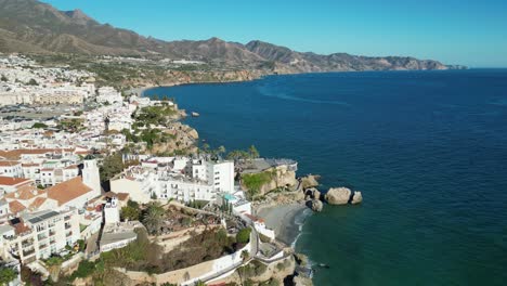 Nerja-Coastal-Village-and-Balcon-de-Europa-at-Costa-del-Sol,-Andalusia,-Spain---Aerial-4k