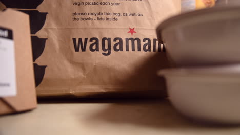 Close-up-of-Wagamama-takeaway-food-on-a-table-at-home
