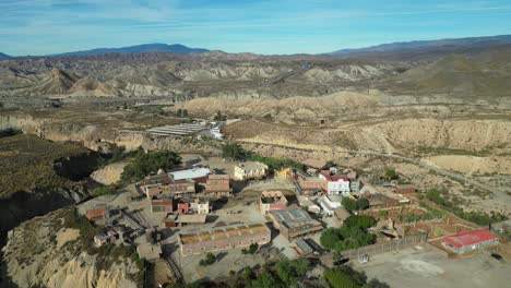 Oasis-Mini-Hollywood-in-Tabernas-Desert,-Almeria,-Andalusia,-Spain---Aerial-4k-Circling