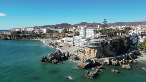 Nerja-Balcon-de-Europa-and-beaches-in-Malaga,-Costa-del-Sol,-Andalusia,-Spain---Aerial-4k-Circling