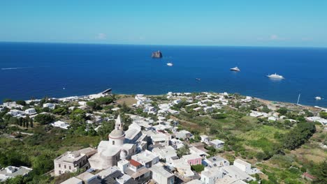 Stromboli-Village-and-San-Vincenzo-Church-at-Aeolian-Islands,-Italy---Aerial-4k