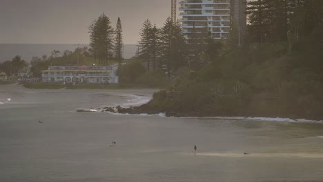 View-across-Coolangatta-with-paddleboarder's-from-Kirra-Hill,-Gold-Coast,-Australia