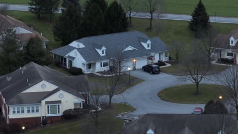 Long-aerial-zoom-of-cottages-at-retirement-home-in-America