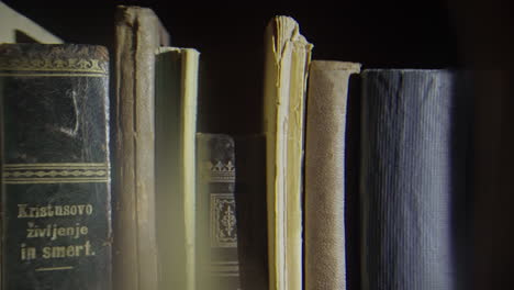 Close-up-shot-of-some-old-books-on-the-shelve