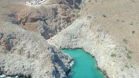 Aerial-Drone-View-Of-Seitan-Limania-Public-Beach-In-Akrotiri-Peninsula,-Chania-region,-Crete-island,-Greece