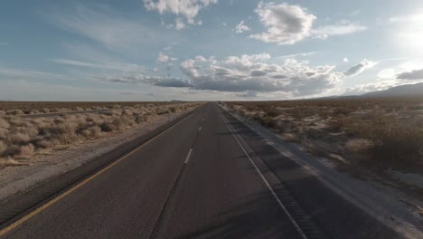A-unique-perspective-driving-South-on-a-desert-road