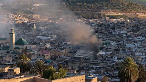 Zooming-shot-of-a-residential-house-fire-in-Fes,-Morocco