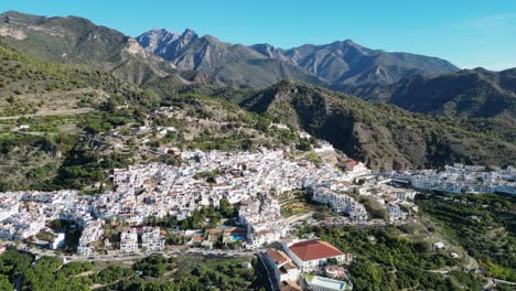 Frigiliana-white-mountain-village-in-Malaga,-Andalusia,-Spain---Aerial-4k-Circling