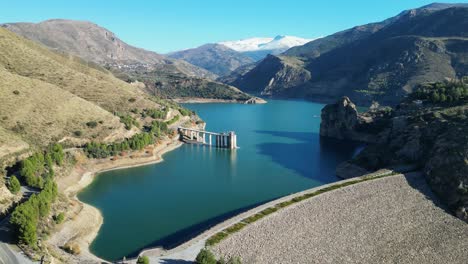 Canales-Water-Reservoir-at-Sierra-Nevada,-Andalusia,-Spain---Aerial-4k