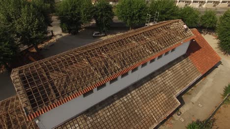 Panoramic-View-of-Wooden-Frame-House-Under-Construction-Roof-Beams-Aerial-View